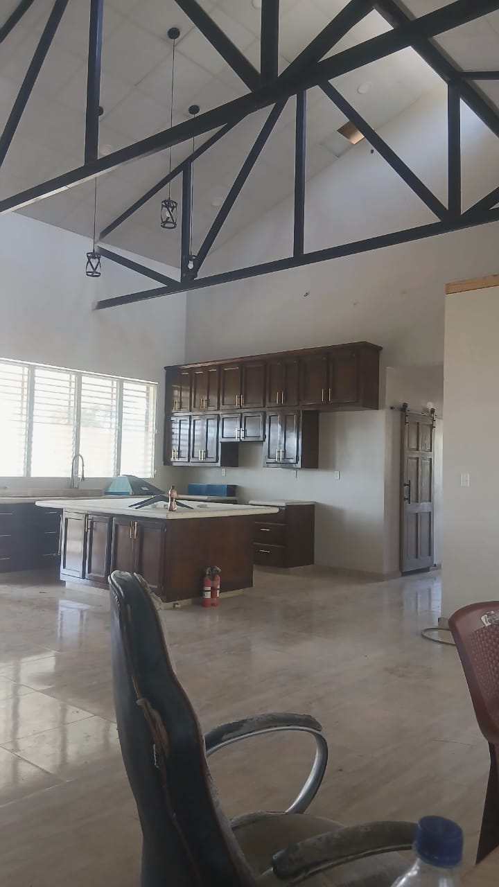 Open-concept kitchen and great room in an MAF residence